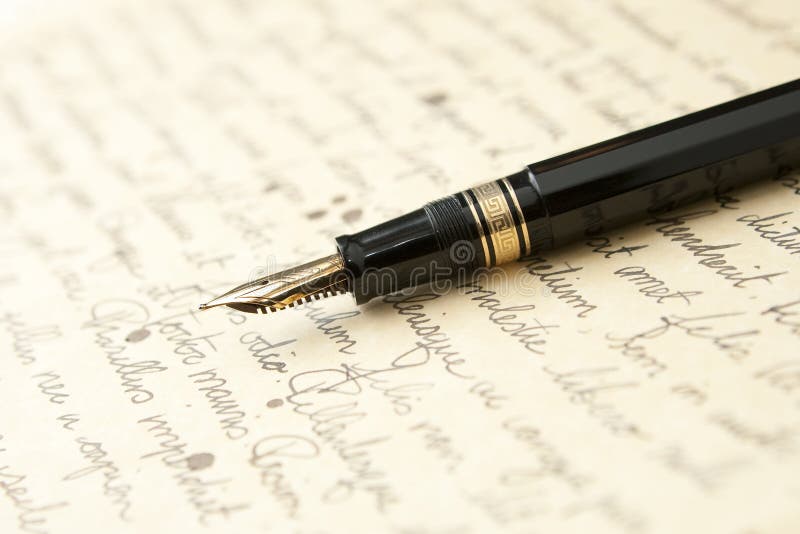 Gold Pen with Letter and Writing