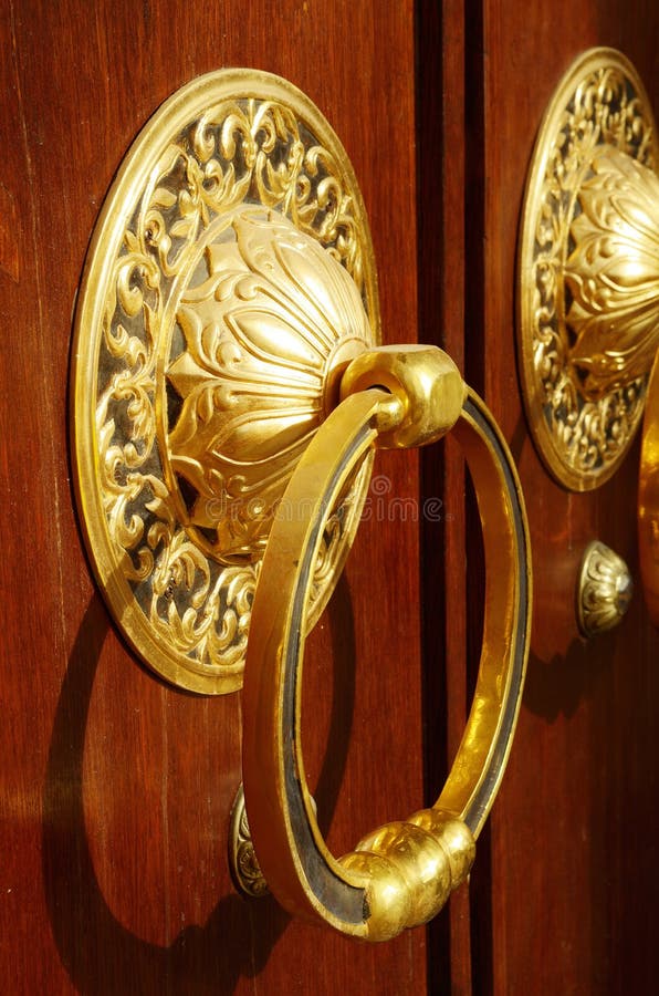 Goldplated Ring on the Door. Stock Image Image of building, hand