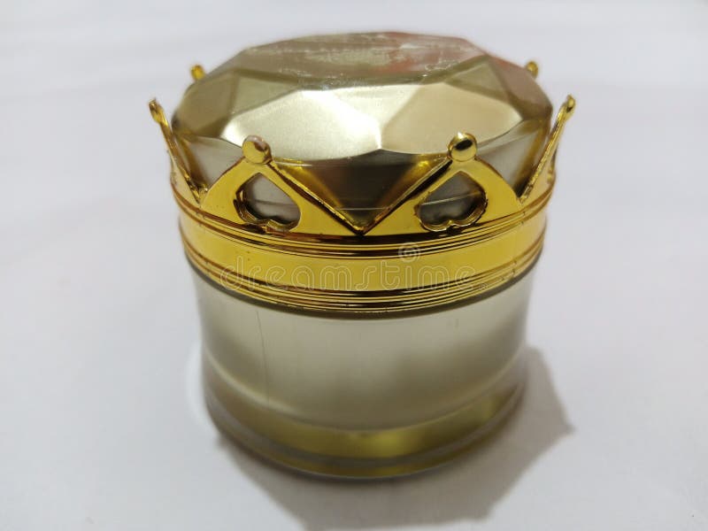 Gold pot jat stock image. Image of gold, hand, bottle 244534009