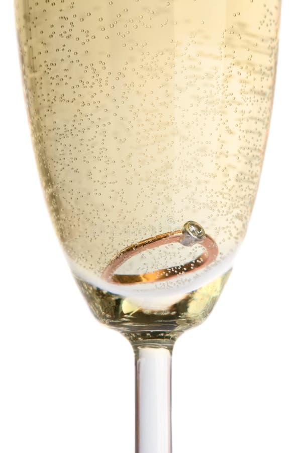 Gold ring in champagne stock photo. Image of dinner, alcohol 5457416