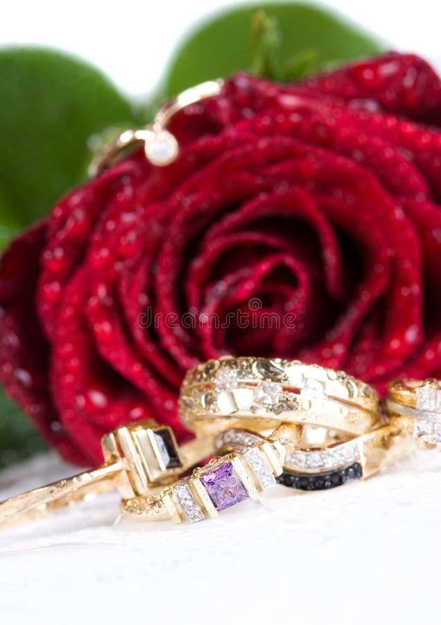 Gold ring and red rose. stock photo. Image of jewellery 11777796