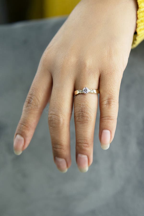 Simple Gold Engagement Rings On Finger