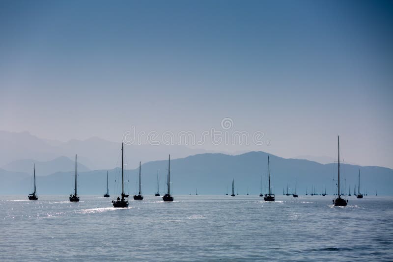Yacht silhouette in the high sea on sunset royalty free stock images Yacht silhouette in the high sea on sunset royalty free stock images