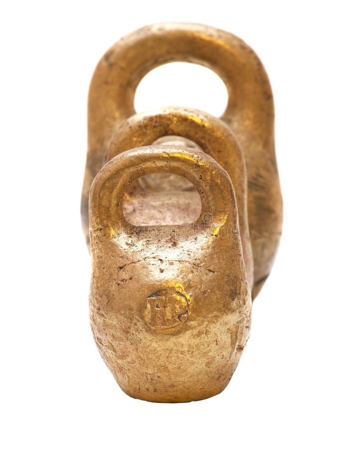 The Gold Rusty Kitchen Scale Weights on White Background Stock Photo