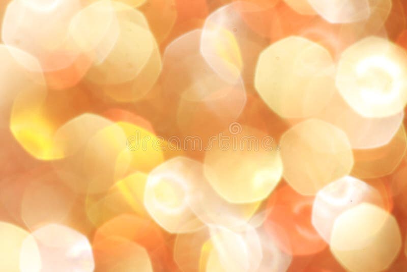 Gold, silver, red, white, orange abstract bokeh lights, defocused background