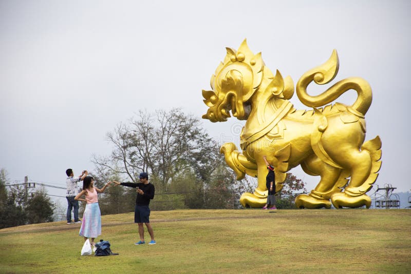 Gold Singha statue on hill in Singha Park at Chiangrai city in Chiang Rai, Thailand royalty free stock photos Gold Singha statue on hill in Singha Park at Chiangrai city in Chiang Rai, Thailand royalty free stock photos