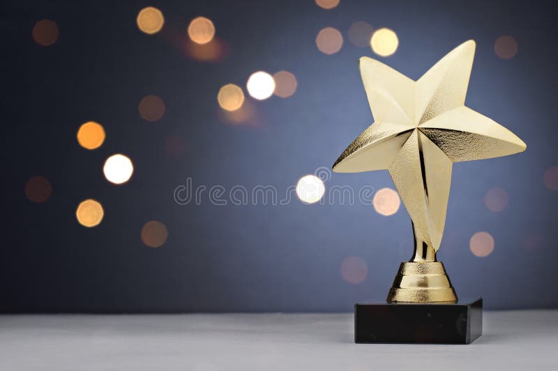 Gold star trophy for a winner or champion