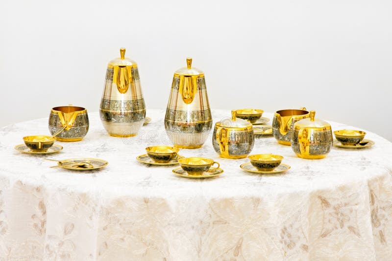 Gold tea set stock image. Image of tablecloth, teapot 12747063