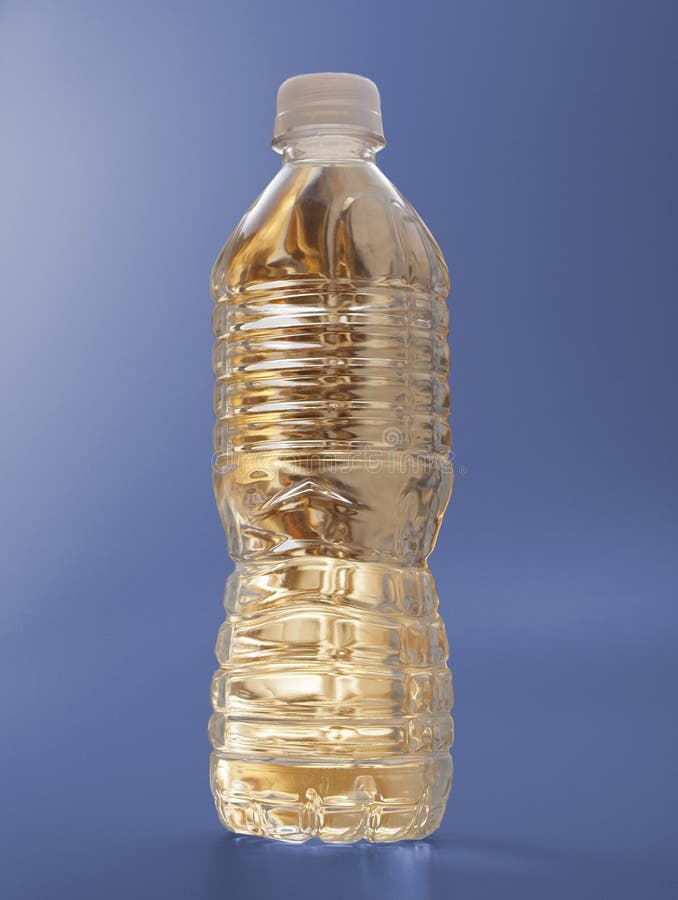 Gold Water bottle on blue stock photo. Image of thirst - 11053494