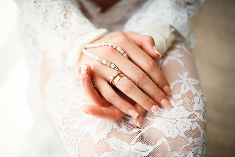 Gold Wedding Rings in the Hands of Bride Stock Image Image of dress