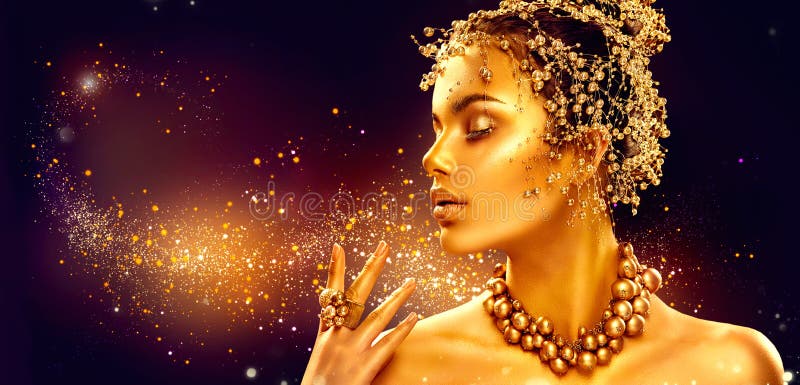 Gold woman skin. Beauty fashion model girl with golden makeup