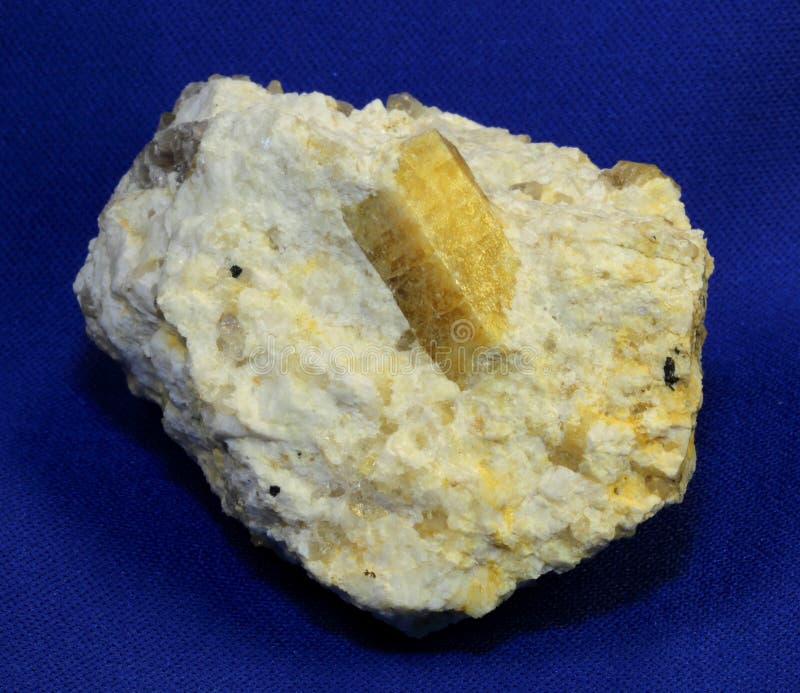 Golden beryl crystal in matrix