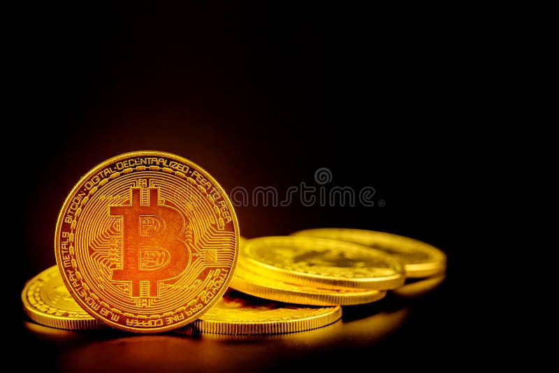 Golden bitcoin is currency digital money with crypto, coin with trade isolated on black background stock photo Golden bitcoin is currency digital money with crypto, coin with trade isolated on black background stock photo