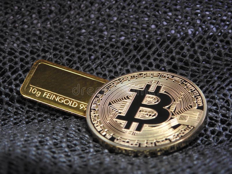 Golden Bitcoin and gold bar. stock images