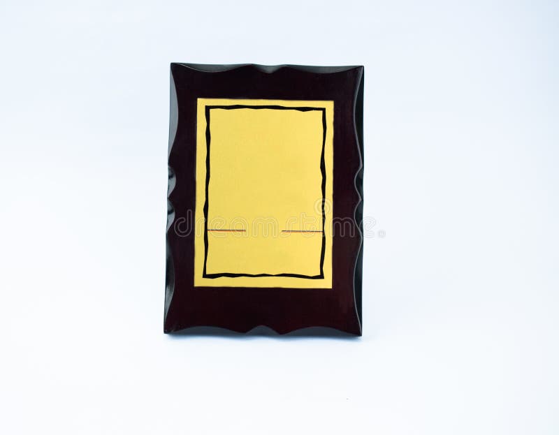 A Golden Black Memento with Border Displayed Over an White Background Stock  Image - Image of desk, cutout: 172727579