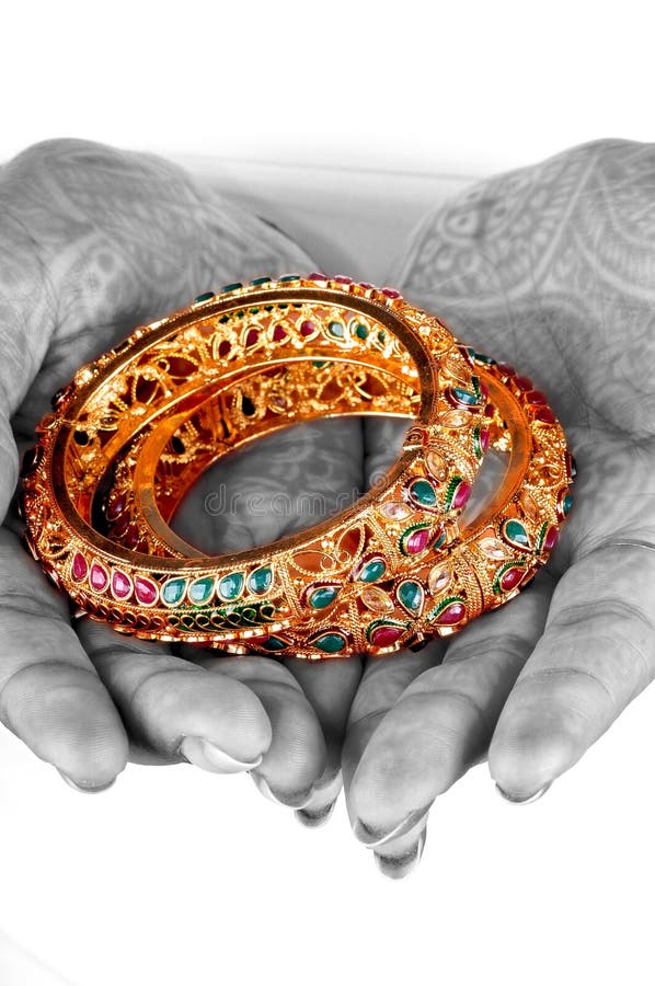 Golden bracelets stock image. Image of glittering, gems 7899569