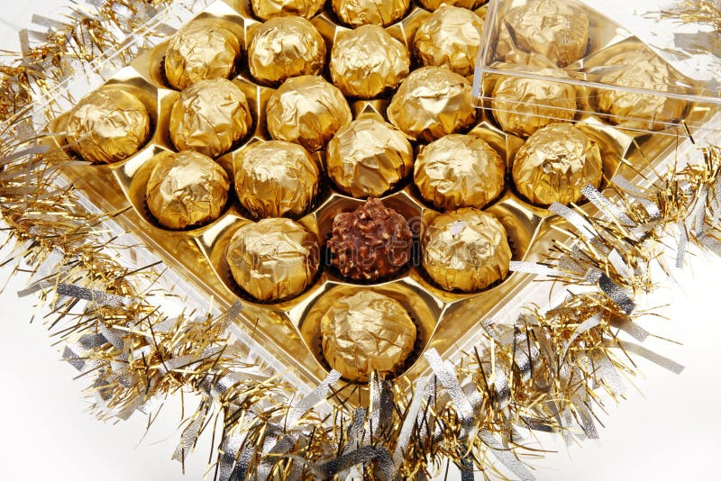 Golden chocolate stock image. Image of foil, delicious 12218311