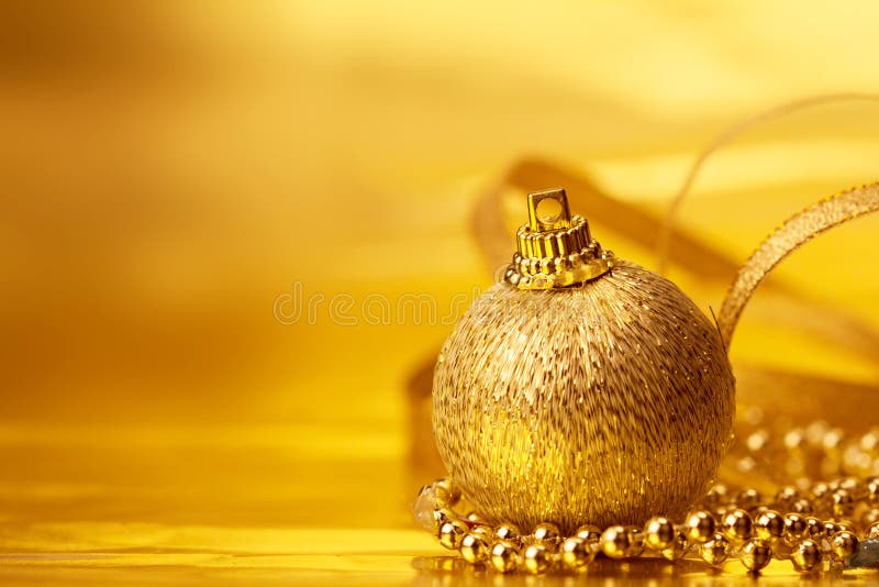 Golden Christmas Ball Decorations for Celebration Background Stock