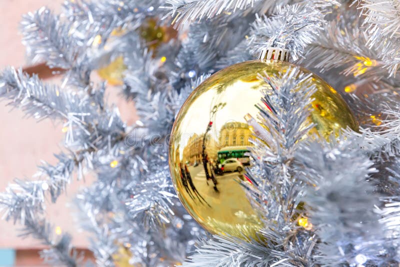 Golden Christmas ball in Paris, France