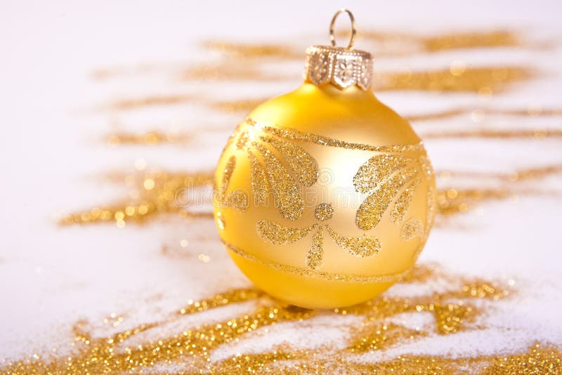 Golden Christmas Decoration. Spilled glitter