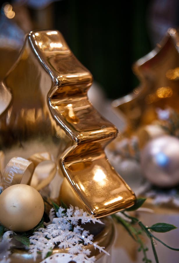 Golden Christmas tree figurine as home decoration stock photos Golden Christmas tree figurine as home decoration stock photos