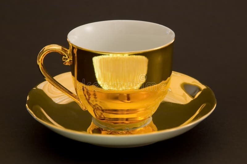 Golden coffee cup stock image. Image of concept, detail 4945041