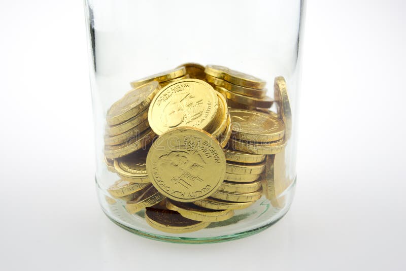 Golden coins in a jar stock image. Image of exchange 90289431