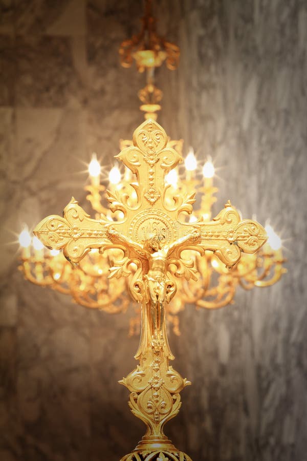 Golden cross with gold Jesus Christ crucifixion stock image Golden cross with gold Jesus Christ crucifixion stock image