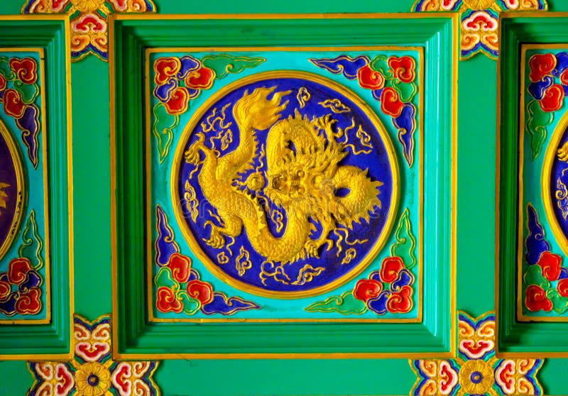 Golden dragon sculpture on ceiling at Chinese Temple, Bangkok, T
