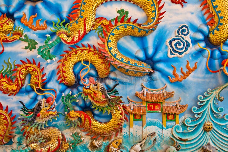 The golden dragon on the wall background