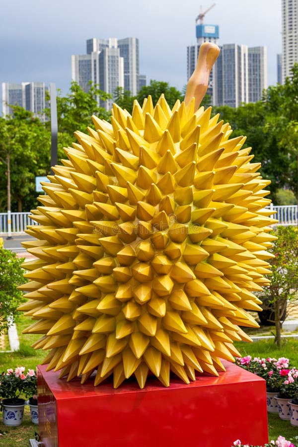 A golden durian sculpture outdoors stock photography