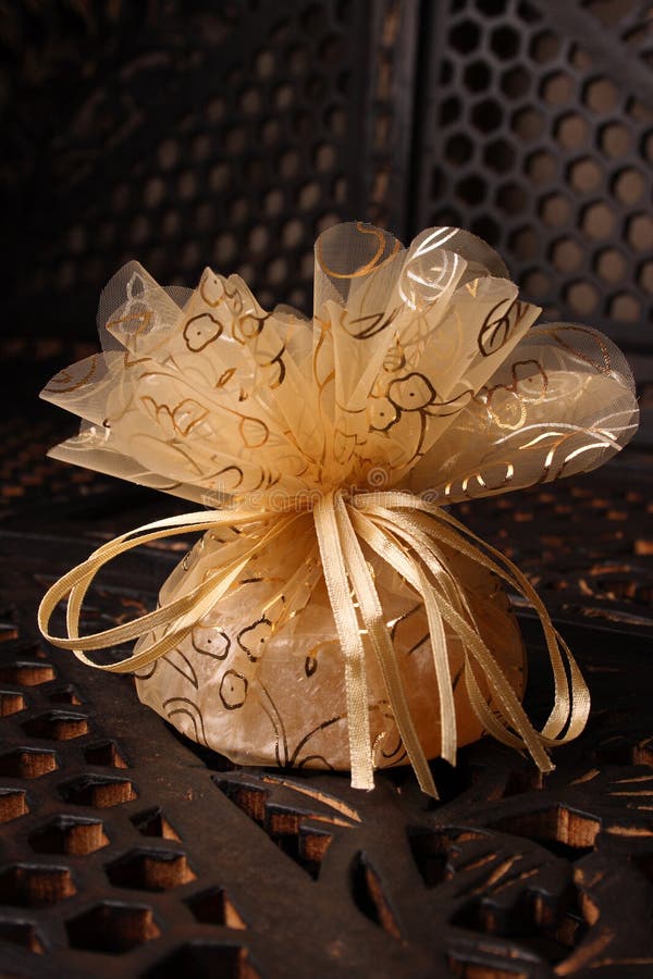 Golden Favour with ribbon