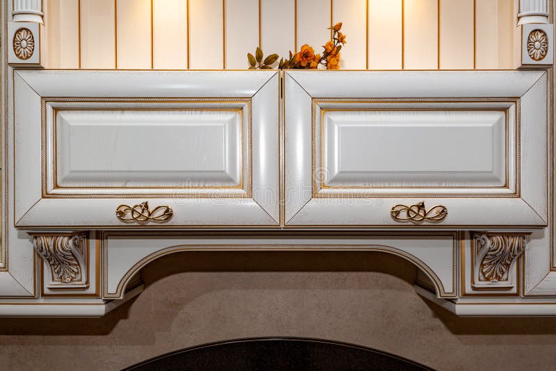 Golden Furniture Handle On White Wooden Dresser Stock Photo
