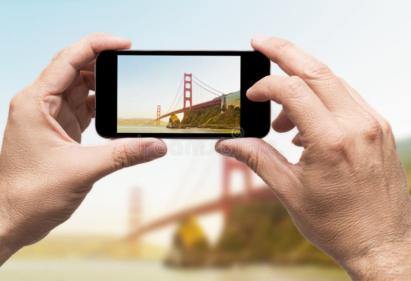 Golden Gate taking picture smart phone stock photography
