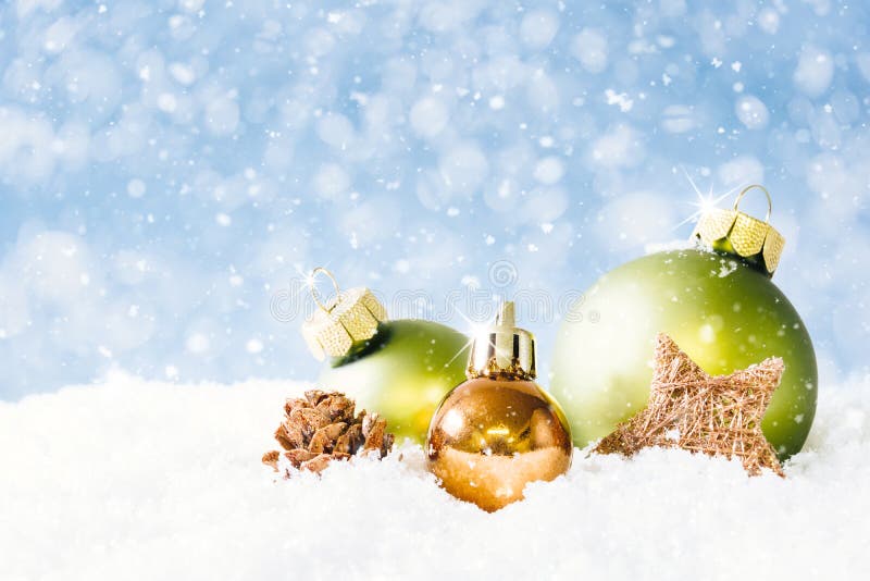 Golden and Green Christmas Balls with falling Snow royalty free stock photos Golden and Green Christmas Balls with falling Snow royalty free stock photos