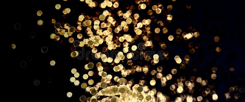 Golden Lens Flares on Black. Abstract Background Stock Photo - Image of