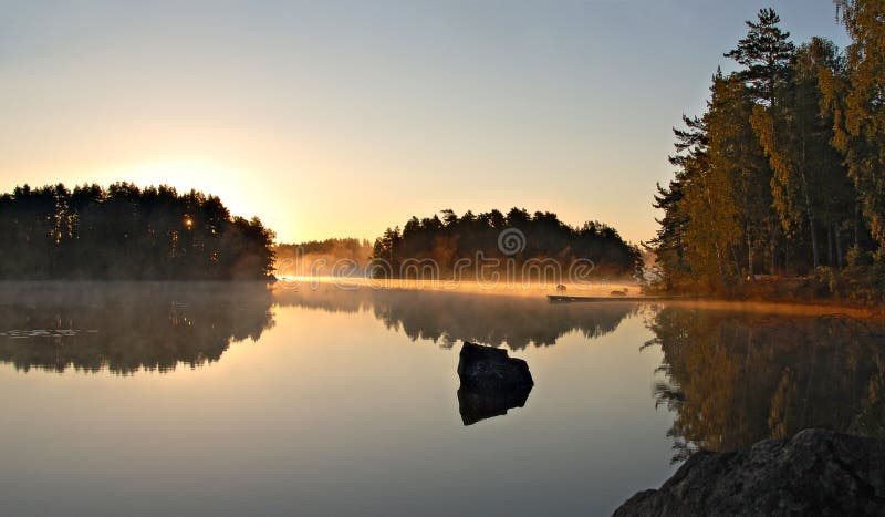 Golden morning sun on a swedish lake