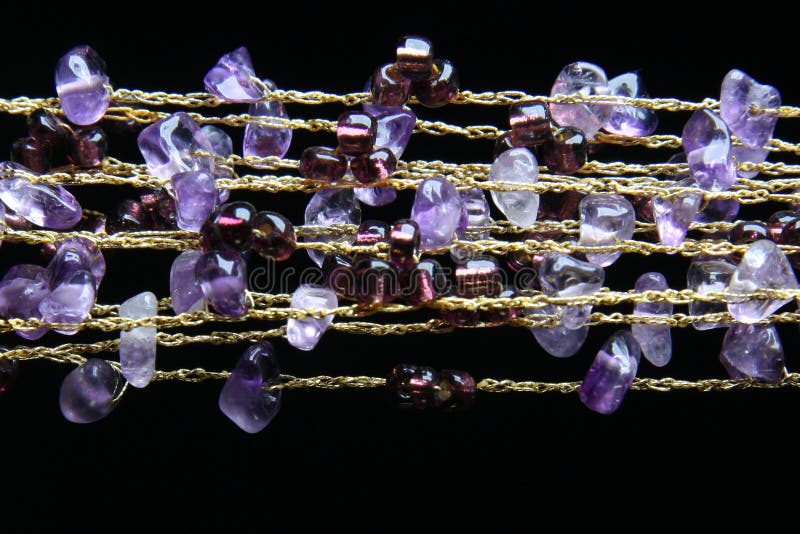 Golden necklace with amethyst stones