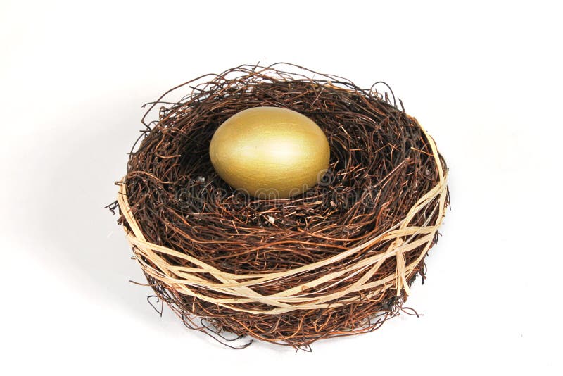Golden nest egg on white royalty free stock photos Golden nest egg on white royalty free stock photos