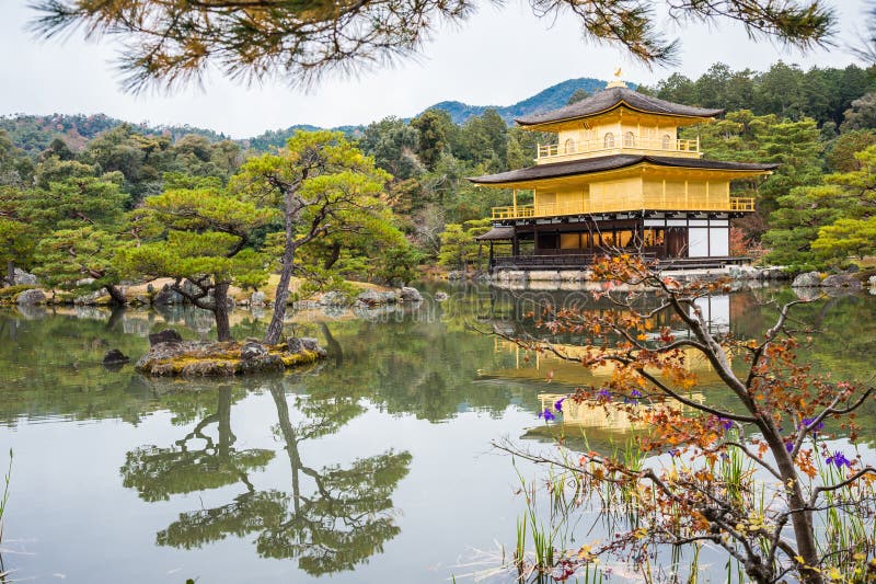 Golden pagoda on lake in autumn at Kinkakuji Temple, Kyoto, Japan.