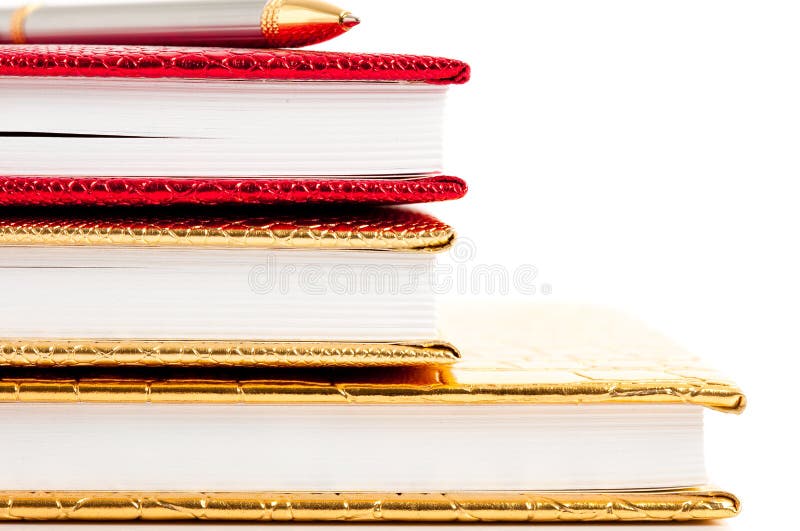 Golden and red notebooks