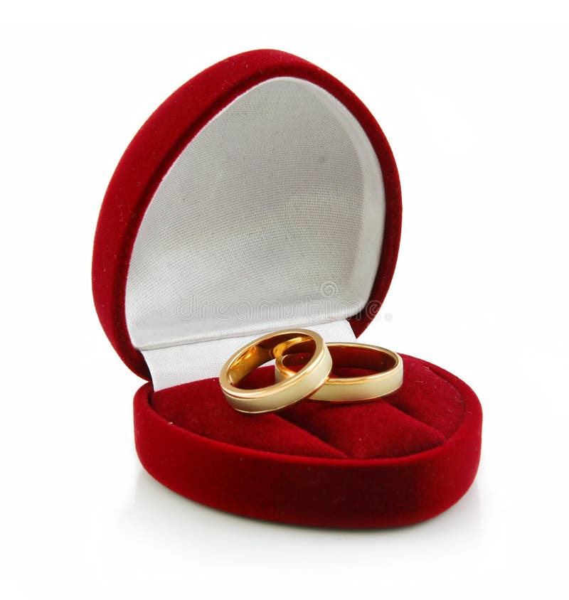 Golden Rings in Heart-Shaped Box Isolated