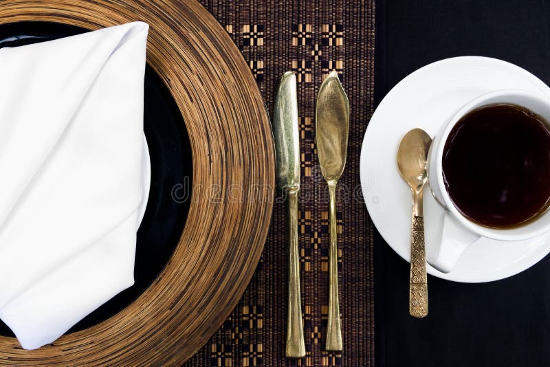 Golden Silverware Laid on a Table with a Plate and a Cup Stock Photo Image of flatware