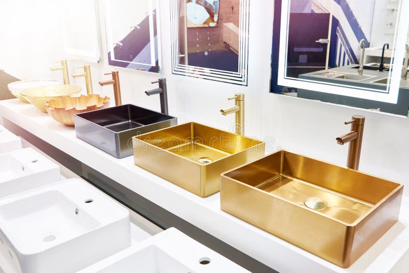 Golden sinks in store stock image. Image of wall, contemporary 254214539