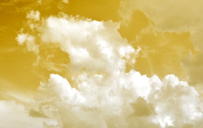 Golden Sky with White Clouds. Beautiful Sky Background and Wallpaper