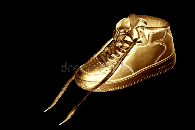 Golden sneaker stock photo. Image of design, boot, comfortable - 196321600