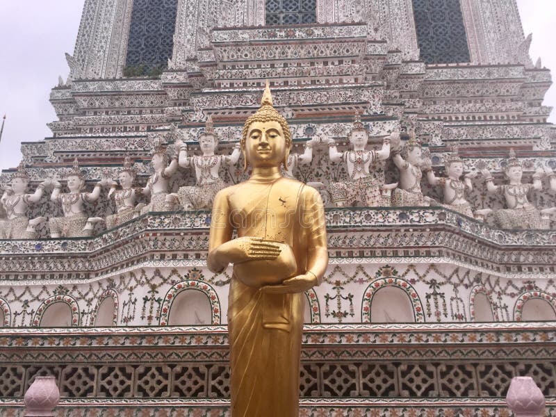 Golden standing Buddha at Wat Arun temple ,Bangkok,Thailand.