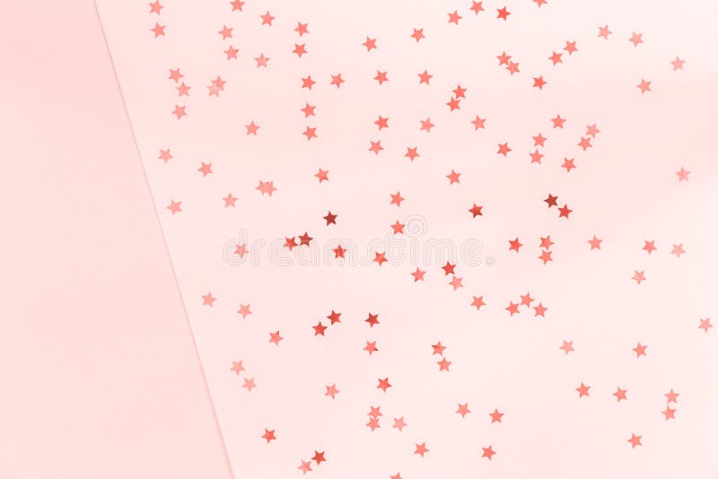 Golden star sprinkles on double pink and blue. Festive holiday background. Celebration concept . Living coral theme - color of the royalty free stock photos Golden star sprinkles on double pink and blue. Festive holiday background. Celebration concept . Living coral theme - color of the royalty free stock photos