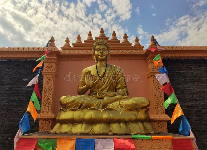 A Golden Statue of Lord Buddha. Stock Photo Image of golden, temple
