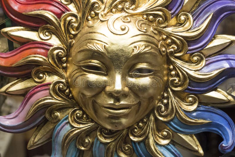 Golden sun mask stock photo. Image of colourful, blue - 110869960
